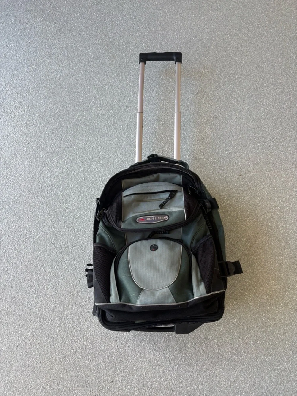 High Sierra Green Rolling Backpack/converts into carry on and regular backpack